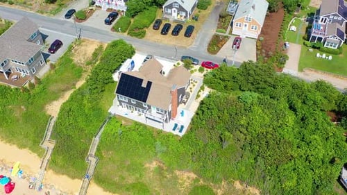Cape Cod Shoreline Home Surrounded by Greenery