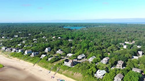 Cape Cod Bay Aerial Drone Footage of Beach Houses, Marsh and Forest Panning Right