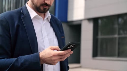 Unrecognizable Pensive Business Man Browsing Smartphone App Chatting Downtown Office Street Closeup