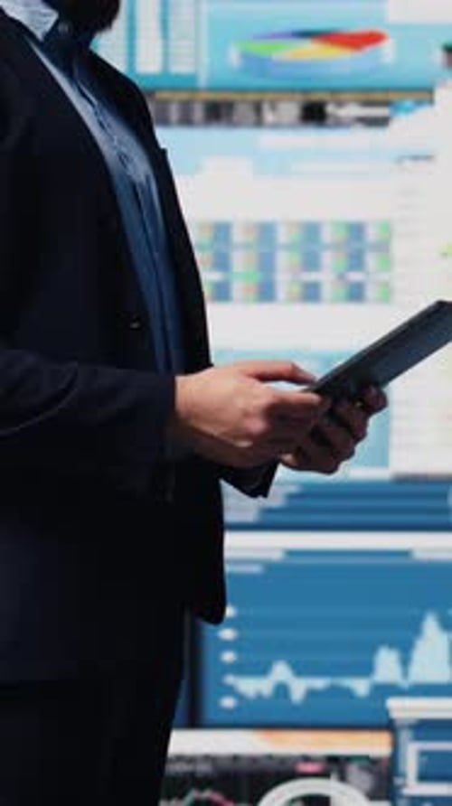Vertical Video Professional Businessman Analyzing Info and Finance Charts on Digital Dashboard