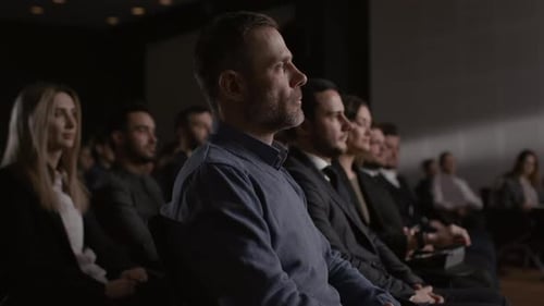 Large Group Of People Listens Speech At Business Conference Or Economy Forum. Political Informati...