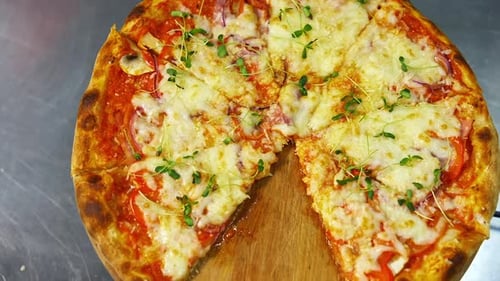 Delicious Pizza with Cheese, Tomato and Sprouts