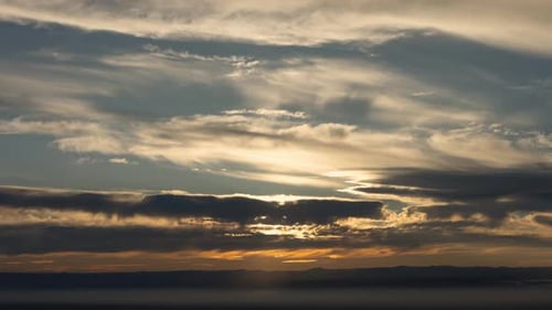 Spectacular Full Sunset with Clouds Timelapse Zoom in