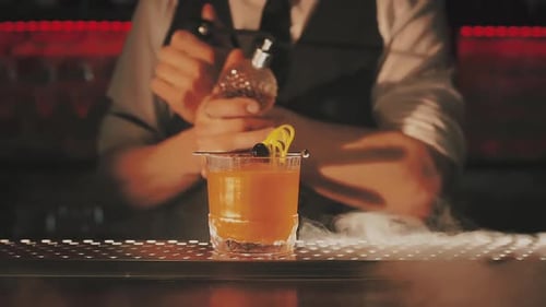 Bartender Making a Cocktail at the Bar