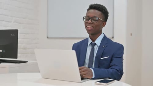 Smiling Man Working from Home, Video Conference