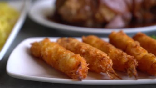 Crispy Fried Shrimp Rolls on a Plate