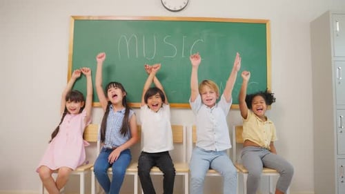 Portrait of diverse children student in classroom at elementary school.