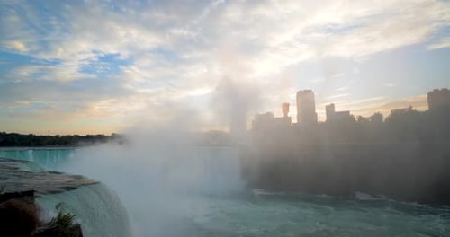 Edge of Niagara Falls Waterfall, Water Cascading Aerial View Above