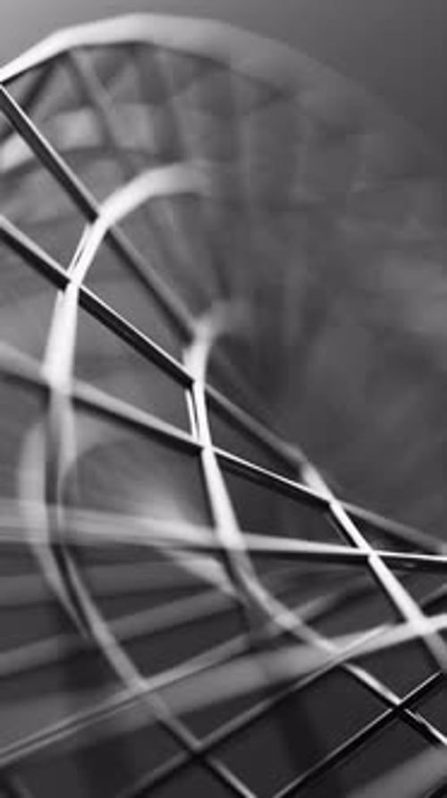 Looped 3D animation of a Mobius strip crafted from chrome mesh.