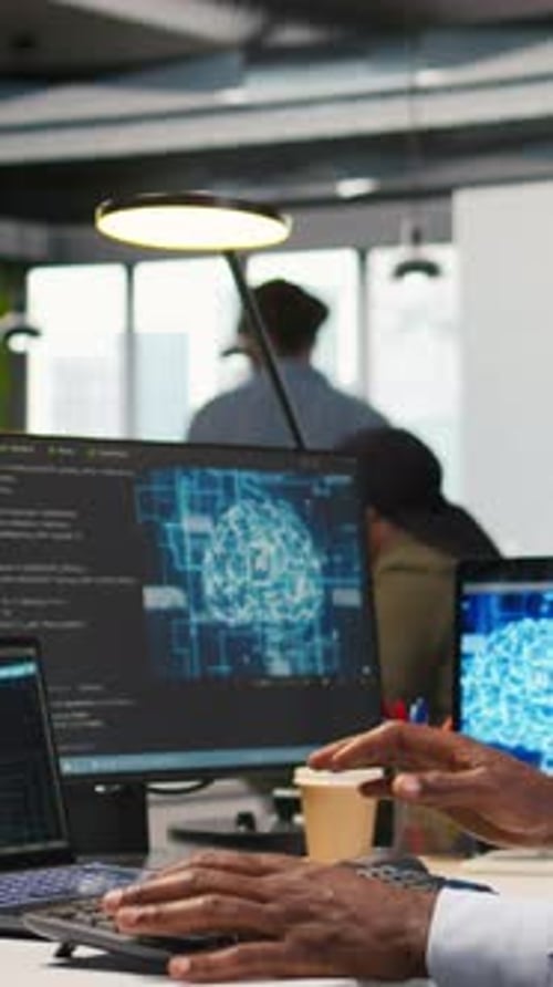 Vertical Video Computer Scientist in Office Integrating AI Machine Learning Systems