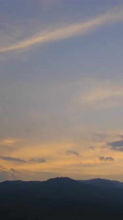 Mountains at Sunset with Golden Sky