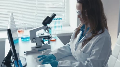 A Bioengineering Scientist Works in a Hightech Medical Laboratory That Uses Cuttingedge Technology