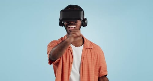 Man, virtual reality and glasses in studio with hand, click and swipe with smile for metaverse by