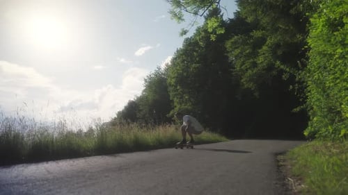 Man on a Skateboard in rural Switzerland