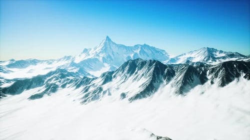 Aerial View Over Vast Snowy Mountain Range