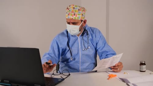 Worried Doctor Checking Results