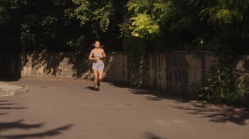 Fitness Woman Running in the City