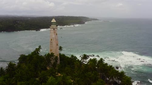 Tropical Lighthouse on Island Aerial View