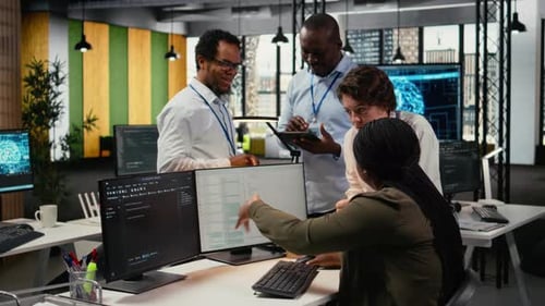 Team of Software Developers in Office Working Together Automating Using AI
