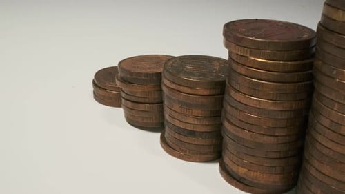 Stacks of Bronze Coins Ascend