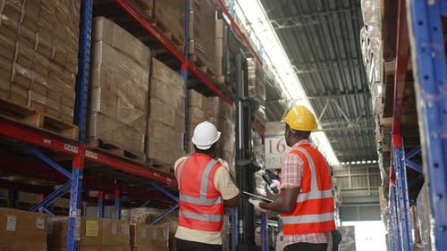 Logistics employees are working warehouse.