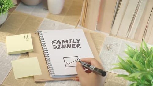 Family Dinner Plans In Notebook