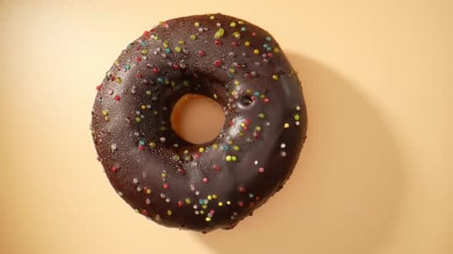 Beautiful brown donuts. 4K