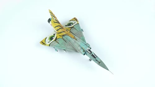 Model Fighter Jet with Tiger Stripes Rotating