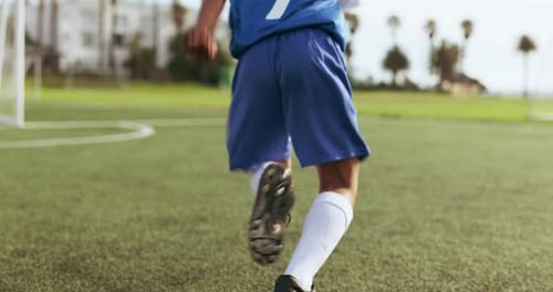Soccer player legs, ball and sports kid shooting, running and practice target aim