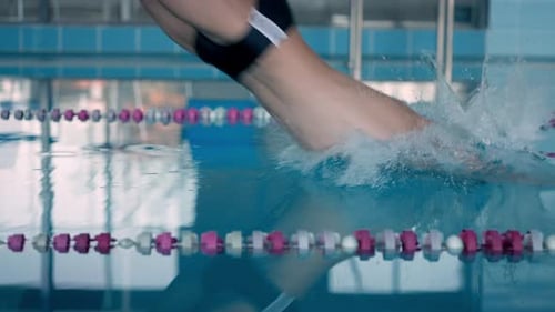 Guy with Glasses Dives in Pool Water with Heavy Splashes