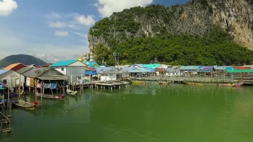 Koh Panyee Traditional Muslim Floating Fisherman Village with Mosque and Limestone Cliffs