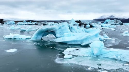 Cinematic Drone View of the Sharp Ice Ridges of Glacier Blue Ice Natural Landscape of the Icelandic