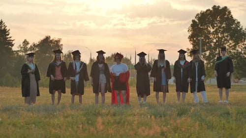 Graduates Take Off Their Robes and Run Down the Field The Concept of Graduation