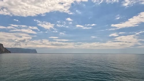 Sea Water Surface Aerial View on Calm Water Surface Camera Flies Over Clear Sea Ocean Sun Glare