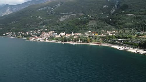 From This Aerial View Lake Garda's Tranquil Waters Seem to Go on Forever The Mountainous Terrain in