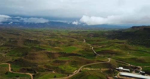 Scenic natural landscape of green plain hills clouds summer season fresh vivid color natural landsca