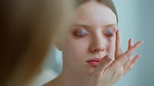 Makeup Artist Work in Her Beauty Studio Portrait of Woman Applying By Professional Make Up Master