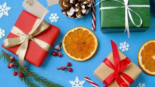 Christmas Presents and Holiday Decorations on Blue Background