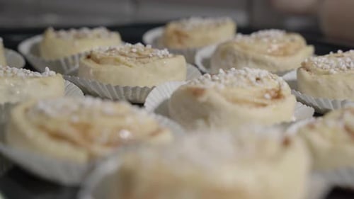 Low static close up of cinnamon buns with focus pulling
