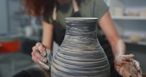 Artist Shaping Clay on Pottery Wheel Close Up