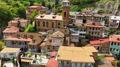 Aerial View of Colorful Houses and Clock Tower in Tbilisi Old Town