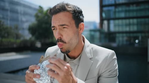 Elegant Boss Tasting Food at Sun Beams City Closeup Businessman Eating Sandwich