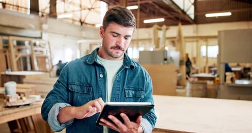 Woodwork, carpenter and man with tablet in workshop for research or planning on app