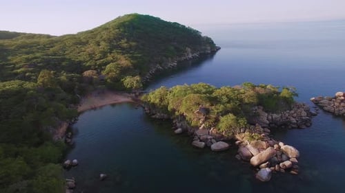 Aerial Drone Quadcopter of Luxury Water Front Hotel Resort on Island, Rustic