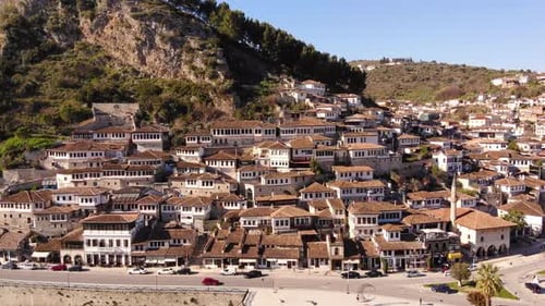 Flying Over Tiled Roofs of Houses Mosques and Minarets in Berat Albania Magnificent Ottoman