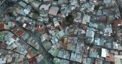 Drone aerial of medellin slums, comuna 13 from above, Colombia city ghetto area, South america.
