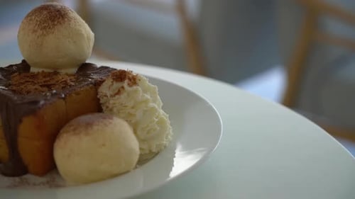 Decadent Chocolate Dessert Topped with Ice Cream