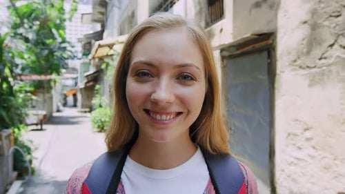 Portrait of Beautiful Backpacker Tourist Girl Smiling at Camera on Bangkok Asian