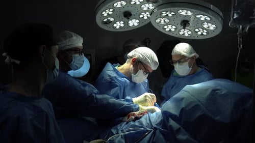 Surgeons Perform Operation in Bright Operating Room