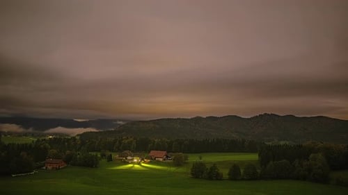 Day to night time lapse of a valley near the Attersee in the Austrian Alps.